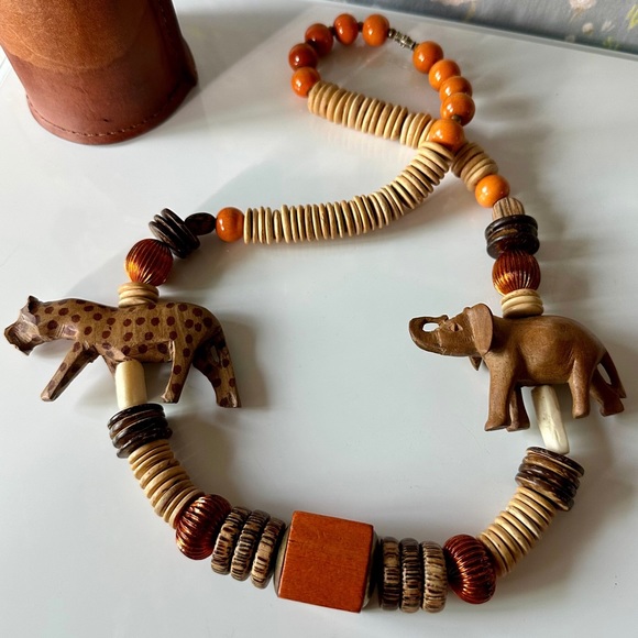 Vintage Jewelry - vintage mcm carved cheetah & elephant mixed materials wooden necklace